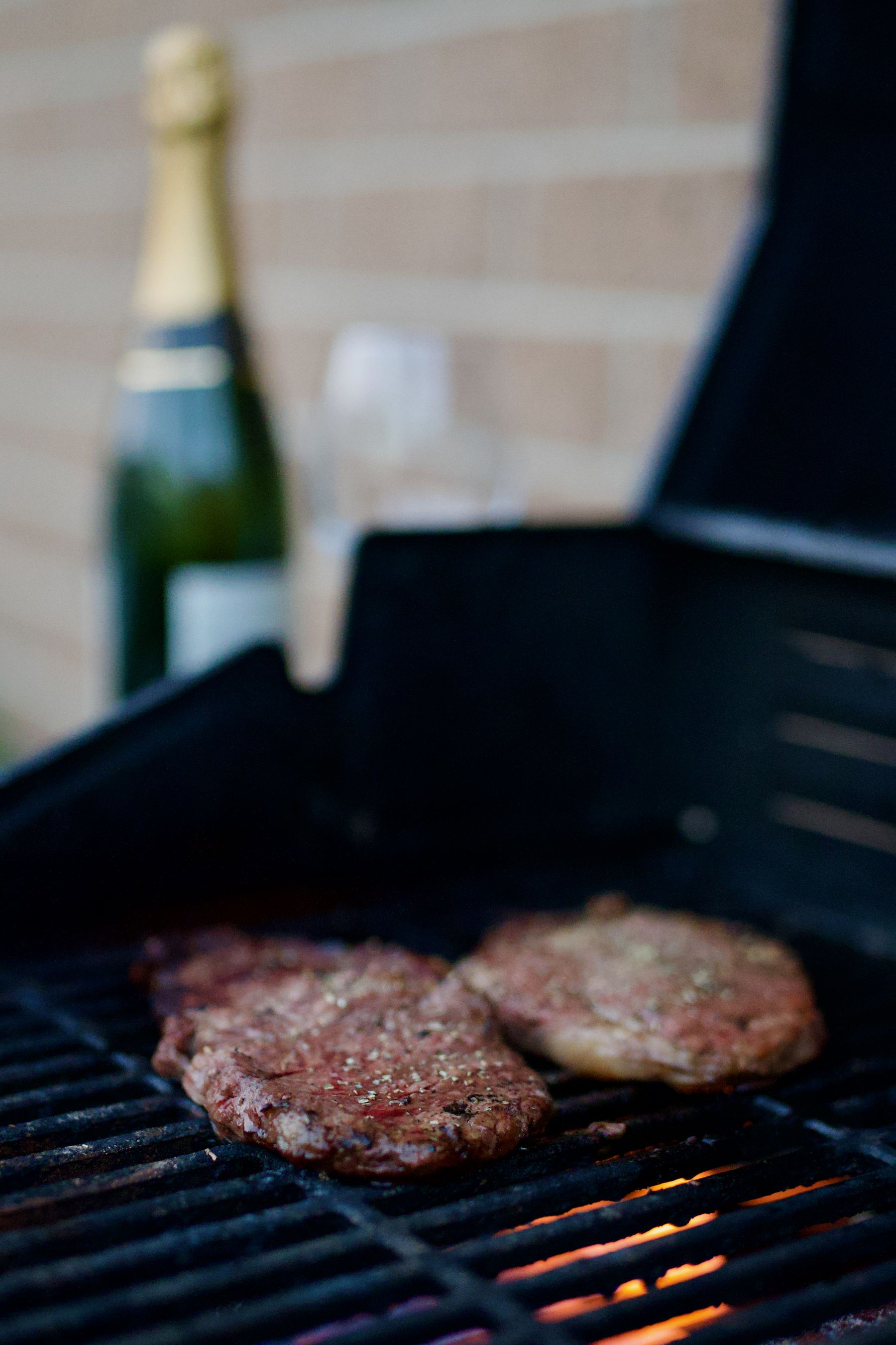 Champagne poured beside the barbecue