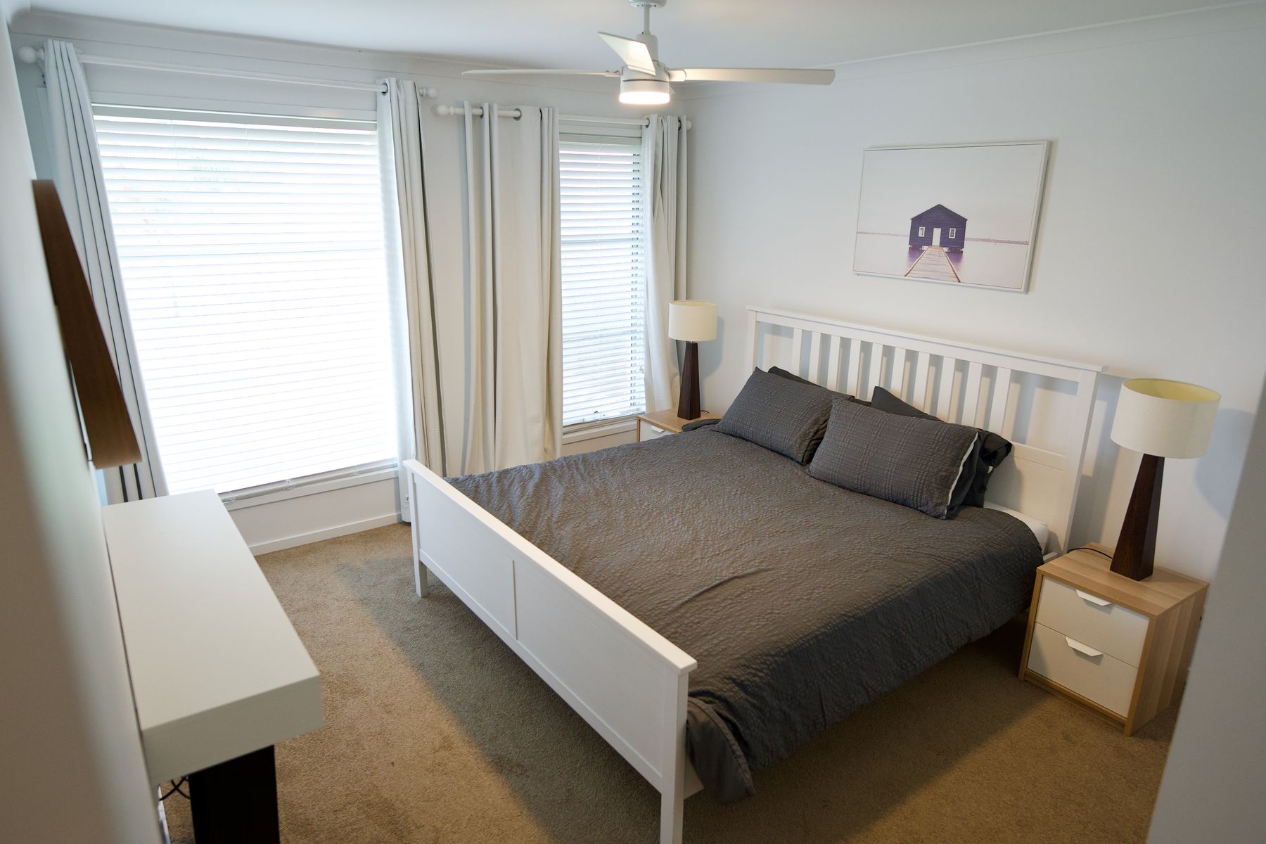 Queen bedroom with soft grey linen