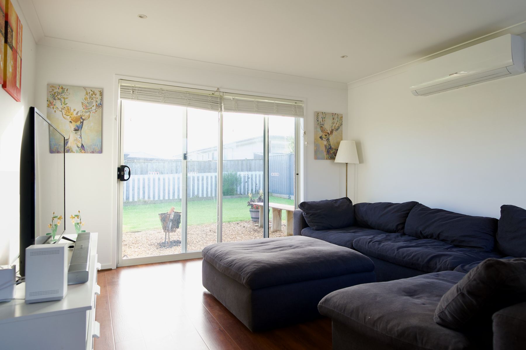 Living room opening onto the back garden