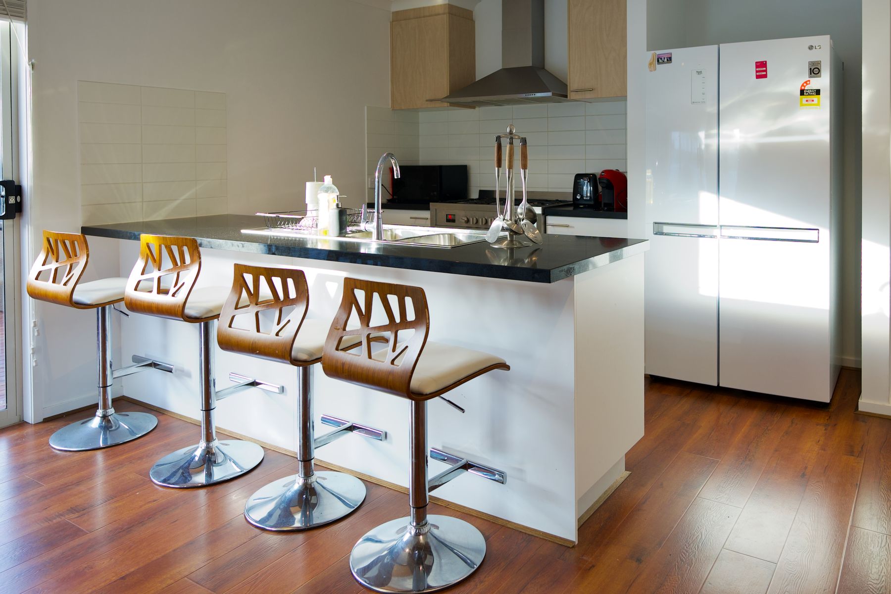Kitchen with white cabinetry